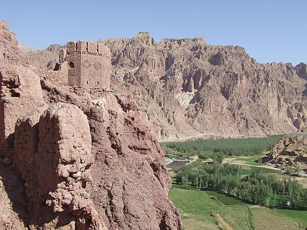 View from Shahr-i-Zohok (the "Red City") in Bamyan Province. Once a citadel housing about 3,000 people, it was destroyed by the Mongols in the 13th century. The invaders also leveled the nearby city that the fortress had protected and massacred all its inhabitants (possibly 150,000) and animals. In memory, the site is today known as Shahr-i-Gholghola (the "City of Screams").