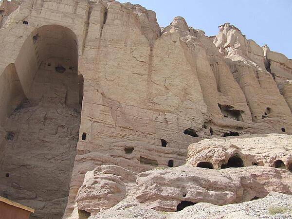 View of the shell of the "Large Buddha" and surrounding caves in Bamyan. The Buddha statue in this cave as well as in another - both dating to the sixth century A.D. - were frequently visited and described over the centuries by travelers on the Silk Road. Both statues were destroyed by the Taliban in 2001.