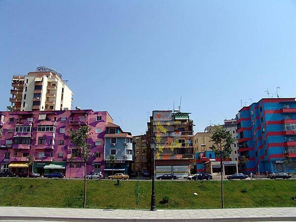 Under Communism, everything was grey and dreary. Today, Tirana's buildings are splashed with color; these are apartment buildings.
