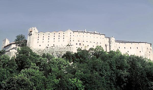 Hohensalzburg Castle overlooks the city of Salzburg. Roughly 250 m long and 150 m wide, it is one of the largest - and best preserved - medieval castles in Europe. Originally built as a wooden fortress in 1077, it was rebuilt and expanded many times in subsequent centuries.