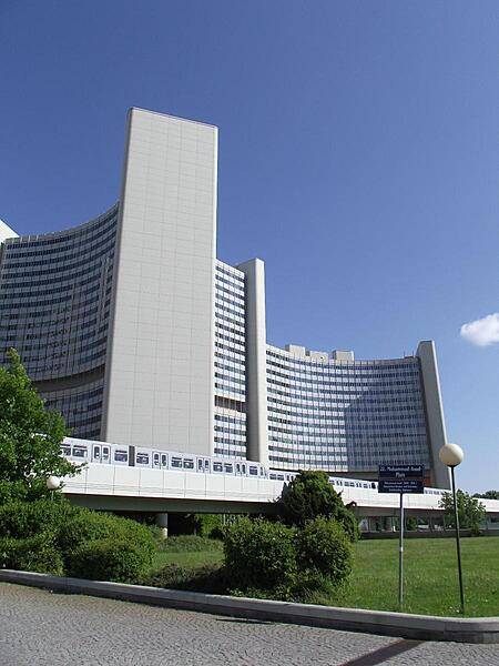 Approaching the towers of the United Nations Office in Vienna. The metro rail line is in the foreground.