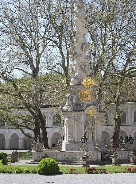 The Baroque Holy Trinity Column in the large inner court of Heiligenkreuz Abbey.
