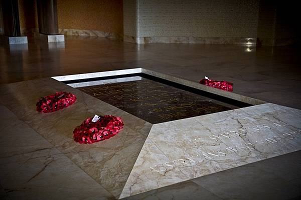 The Tomb of the Unknown Australian Soldier located in the Hall of Memory at the Australian War Memorial in Canberra, capital of Australia. The remains interred here are those of an Australian soldier killed in France during the First World War. Initially buried in the cemetery at Villers-Bretonneux in France, the body was returned to Australia and laid to rest in this tomb on 11 November 1993, the 75th anniversary of the end of the First World War. Villers-Bretonneux became famous as the scene of a counteroffensive by Australian troops in 1918. Photo courtesy of the US Marine Corps/ Sgt. Mallory S. VanderSchans.