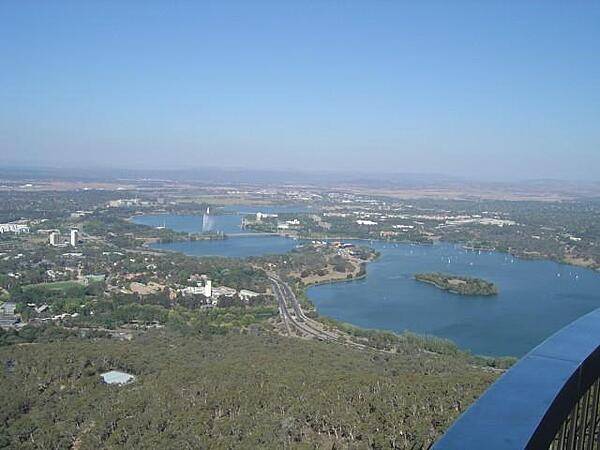 A view of Lake Burley Griffin and the south side of Canberra from Black Mountain Tower. The telecommunications tower (opened in 1980 and formerly known as the Telstra Tower) rises 195 m (640 ft) above the mountain summit.