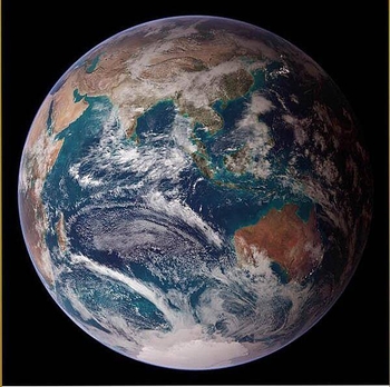 This "blue marble" image of the globe merges data from multiple satellite missions (not all collected at the same time). The focus in this view is the Indian Ocean and its surrounding land masses. Notice the city lights on the night side of the globe, in Japan in the north and in eastern Australia in the south. Image courtesy of NASA.