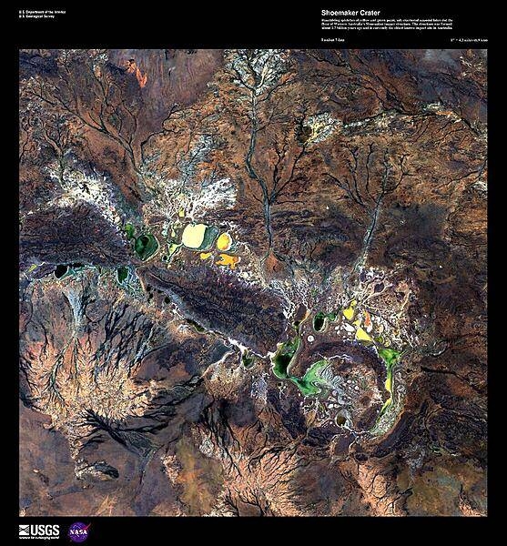 Resembling splotches of yellow and green paint, salt-encrusted seasonal lakes - the largest of which is Lake Teague - dot the floor of the Shoemaker impact crater in this enhanced satellite image. Formerly known as the Teague Ring, the structure was formed about 1.7 billion years ago and is currently the oldest known impact site in Australia. Image courtesy of USGS.