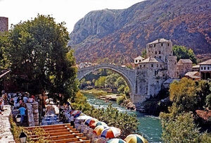The famous Stari Most (Old Bridge) in Mostar connects the two parts of the city divided by the Neretva River. Built during  the 16th century under Suleiman the Magnificent, the bridge was destroyed in 1993 during the Bosnian War, but was subsequently rebuilt and reopened in 2004.