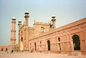 The entrance to the Badshahi Mosque, or “imperial mosque,” as viewed from the mosque courtyard. The mosque, built by the Mughal emperor Aurangzeb from 1671-1673, is the last great mosque built during the Mughal period; its courtyard can accommodate 100,000 worshipers. The gateway leads out to the garden known as Hazuri Bagh, beyond which is the Alamgiri gate of the Lahore Fort.
