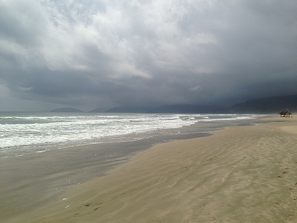 Low-hanging clouds threaten a deserted My Khe Beach (China Beach) near Da Nang.