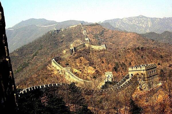 Multiple watchtowers along a section of the Great Wall.