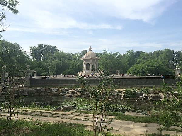 The Summer Palace is a vast ensemble of lakes, gardens, and palaces in Beijing. It was an imperial garden in the Qing dynasty (1644 to 1912). UNESCO added the Summer Palace to its World Heritage List in 1998. This view shows a folly on the grounds of the Summer Palace in Beijing.
