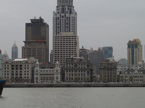 View of The Bund area in Shanghai from across the Huongpu River. "Bund" is an Anglo-Indian word for an embankment of a muddy waterfront.