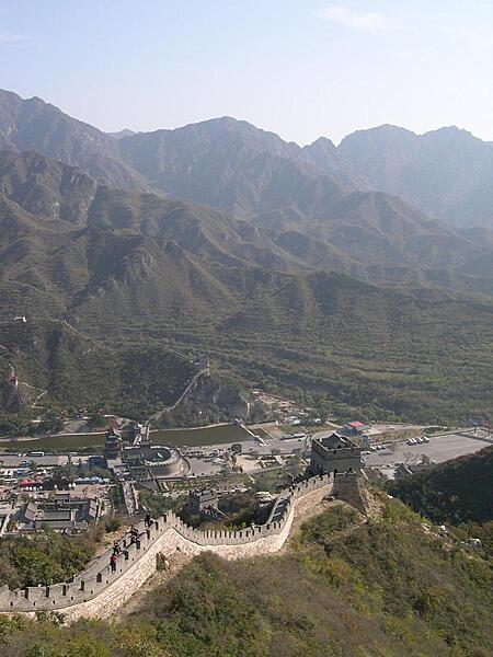 The Juyongguan section of the Great Wall is closest to Beijing and is therefore its most visited portion. Most of the existing Great Wall was built during the Ming Dynasty (14th to 17th centuries) to protect the northern borders of the Chinese Empire. The Manchus conquered the Empire in the mid-17th century and established the Qing Dynasty; they added so much more territory to the Empire beyond the Great Wall that the structure was no longer needed to protect the Empire from outside invaders.