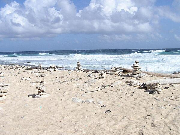 Rock figurines on a beach along the east shore.