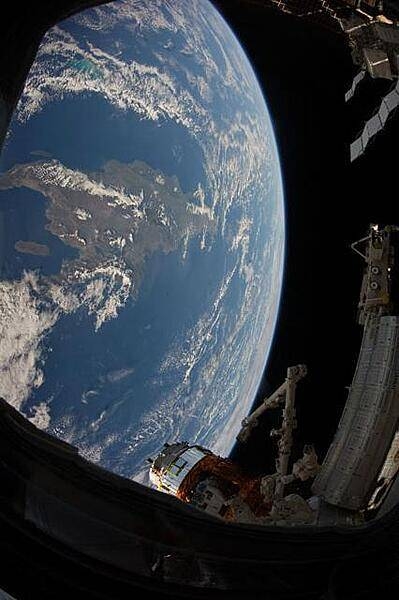The Caribbean island of Hispaniola, jointly occupied by Haiti and the Dominican Republic, dominates this space station view of the earth. Haiti, with its northern and southern pincer-like peninsulas, takes up the western third of the island, while the Dominican Republic occupies the triangular eastern two-thirds. Photo courtesy of NASA.