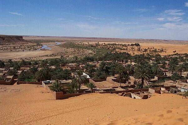 The oasis ksar (Berber village) of Beni Abbes. The site was first inhabited in the 12th century by a tribe from Mauritania. The town today has an old part made up of semi-attached houses, granaries, mosques, baths, ovens, and shops, and a new part with a research center composed of a museum, zoo, and botanical garden. The old part has been largely uninhabited for decades, but enough remains to give a good representation of traditional desert architecture.