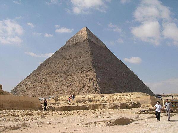 The Pyramid of Khafre is the second largest pyramid of Giza. Smooth casing stones still cover most of the upper portion of the pyramid.