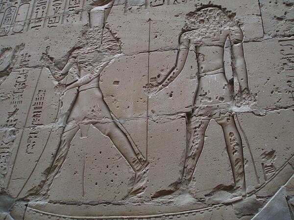 Reliefs showing the god Horus defeating his uncle Seth at the Temple of Horus at Edfu. The reliefs probably were damaged by early Christians to remove faces and hands.