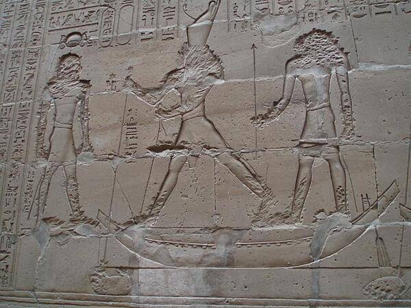 Reliefs showing the god Horus defeating his uncle Seth at the Temple of Horus at Edfu. The reliefs probably were damaged by early Christians to remove faces and hands.