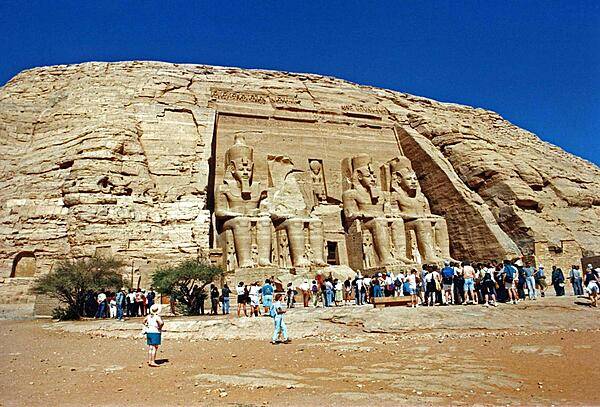 The temples at Abu Simbel were moved to higher ground in the 1960s to save them from the flooding caused by the completion of the Aswan Dam. The carvings on the Great Temple shown here (completed about 1265 B.C.) dwarf mere humans.