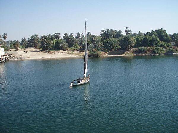 A felucca glides along the Nile River south of Edfu.