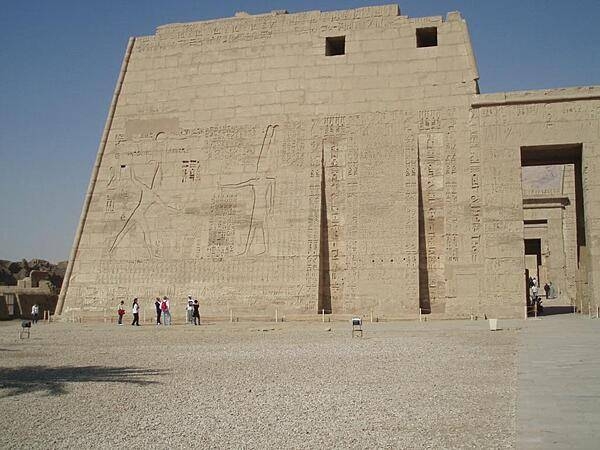 Left pylon of the Mortuary Temple of Ramses III at Medinet Habu showing the pharaoh's military victories.