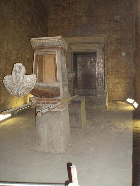 The reproduction of a barque used to transport the god Horus in religious processions around the town of Edfu and on boats north to Dendera to visit the god Hathor. The barque is in the inner sanctuary of the Temple of Horus at Edfu.
