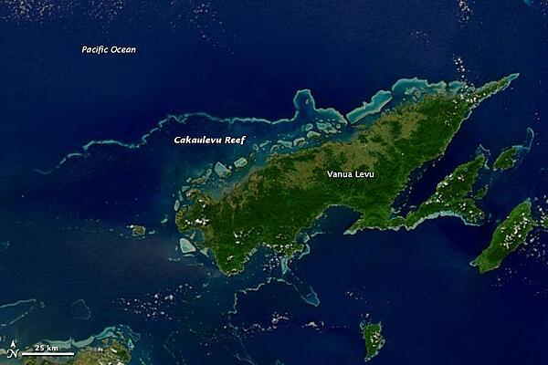 This satellite image shows Fiji's second-largest island, Vanua Levu, and the Cakaulevu Reef that shelters the island's northern shore. Also called the Great Sea Reef, Cakaulevu shines turquoise through clear, shallow waters. It is the third longest continuous barrier reef in the world, behind the Great Barrier Reef in Australia and the Mesoamerica Reef off Central America. When combined with the nearby Pascoe Reef, Cakaulevu Reef is about 200 km (120 mi) long. On its own, the Cakaulevu Reef covers 202,700 sq km (77,200 sq mi).

The first systematic survey of the reef (in 2004) revealed a diverse marine population, including unique mangrove ecosystems and endemic fish. Twelve threatened species live within the reef: 10 fish species, the green turtle, and the spinner dolphin. All of this marine life has traditionally supported the native population, and currently some 70,000 people depend on the reef. After seeing fish populations decline in recent decades, local leaders created a series of marine protected areas in 2005 where fishing is prohibited. Where the ban has been enforced, fish populations have rebounded and spilled over into areas where fishing is permitted. Photo courtesy of NASA.