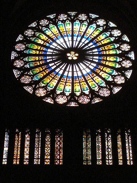 Rose windows, such as this one in Strasbourg Cathedral, are a common feature of Gothic architecture.