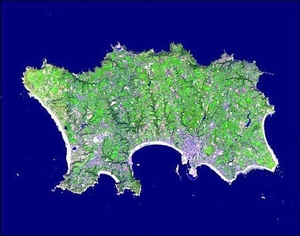 The Isle of Jersey (officially called the Bailiwick of Jersey) is the largest of the Channel Islands in the Bay of Mont St. Michel off the northwest coast of France. This Terra satellite image vividly displays the island's agricultural patchwork terrain. Image courtesy of NASA.