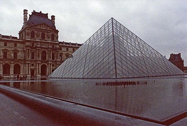 The Louvre Pyramid, built in 1989, serves as the main entrance to the Louvre, one of the world's largest and most visited museums. Objects dating from prehistory to the 19th century are on display there.