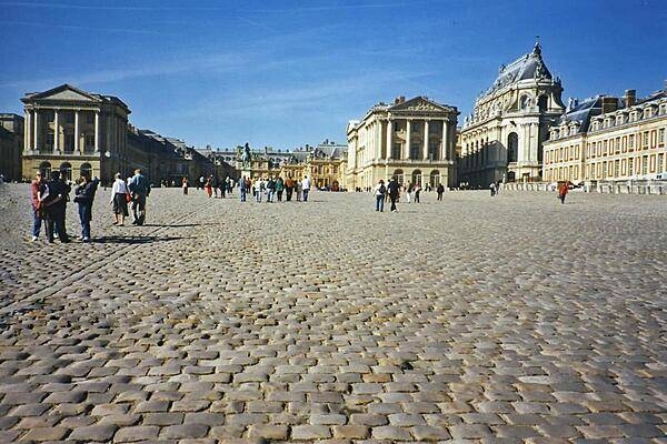 The massive courtyard at the Chateau de Versailles (Palace of Versailles). Most of the construction at the sprawling site was carried out in four phases between 1664 and 1710, during the reign of Louis XIV.