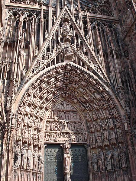 The famous west portal of the Strasbourg Cathedral is in the Gothic style and has hundreds of figures sculpted into it.