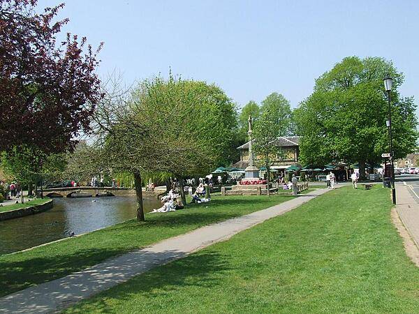 A sunny afternoon in Bournton-on-the-Water, Cotswolds district, England.