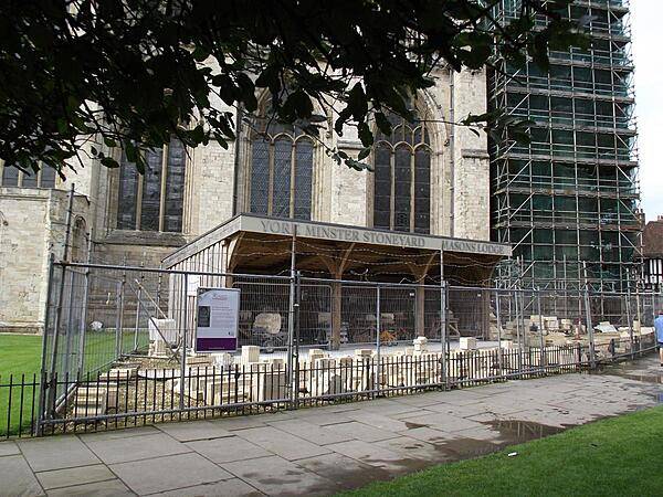 Time, weather, and pollution have all taken their toll on the carvings decorating the exterior of York Minster. Sections of the cathedral continue to undergo restoration. Replacement stonework is fashioned in a special stoneyard next to the cathedral.