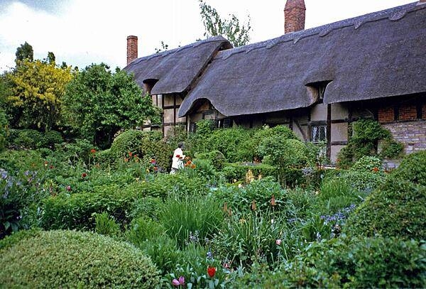 Anne Hathaway's Cottage, near Stratford-on-Avon, England, is a spacious 12-room house where Anne - Shakespeare's wife - was brought up.
