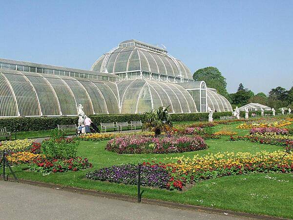 The Palm House at the Royal Botanic Gardens in Kew, England is the largest Victorian glasshouse in the world. Kew Gardens is a UNESCO World Heritage site.