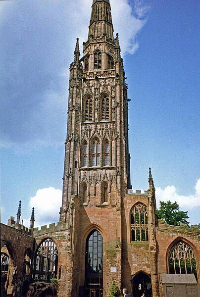 Tower, spire, and part of the outer wall of the old St. Michael's Coventry Cathedral, England.  Built in the late 14th and early 15th centuries, the church was bombed and almost obliterated during the Blitz in 1940. Today it stands next to the new cathedral and serves as a place of reflection and reconciliation.