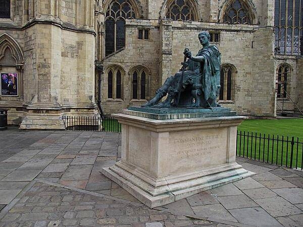 Statue of Roman Emperor Constantine at the south transept of York Minster. This is near the spot where Constantine was proclaimed Augustus (i.e., co-emperor) in 306 A.D. by his troops. Following a six-year civil war, Constantine became sole emperor and allowed religious freedom throughout the empire. His Edict proved a turning point for the spread of the Christian Church.