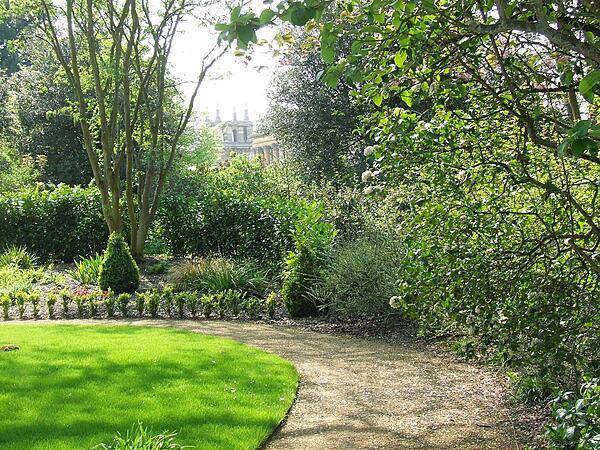 One of the belvederes gracing the west end of Blenheim Palace as seen through some of the trees on the grounds of the estate.