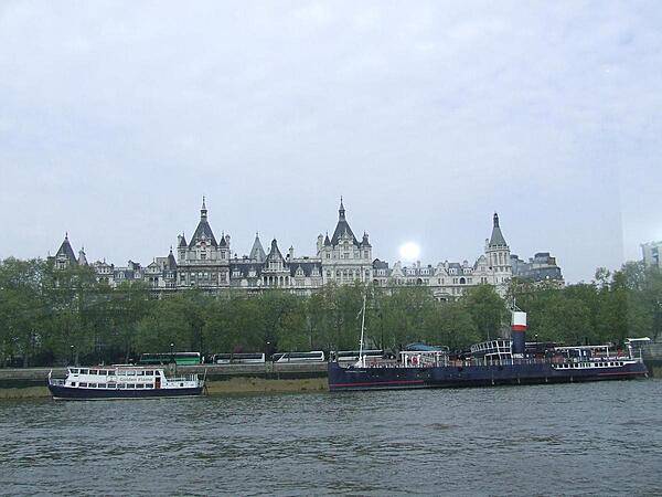 Whitehall Court as seen from the River Thames, London. Although one contiguous building, it consists of two separate constructions. The left portion of the building is The Royal Horseguards hotel, while the remainder is residential.