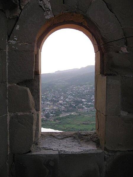 View of Mtskheta through a window opening at the Jvari Monastery (Monastery of the Cross).