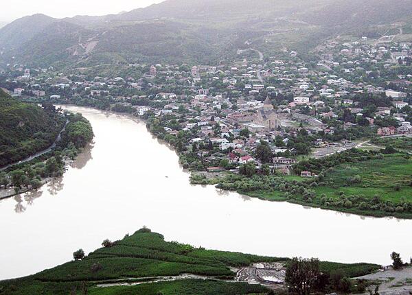 A more panoramic view of Mtskheta from the Jvari Monastery. The town, which lies at the confluence of the Mtkvari (Kura) and Aragvi rivers, served as the capital of the Georgian Kingdom of Iberia from the 3rd century B.C. to the 5th century A.D. It was the site where Christianity was proclaimed the state religion of Georgia in 317. Although the capital was moved to Tbilisi in the early 6th century, Mtskheta continued to serve as the coronation and burial place for most Georgian kings until the 19th century.
