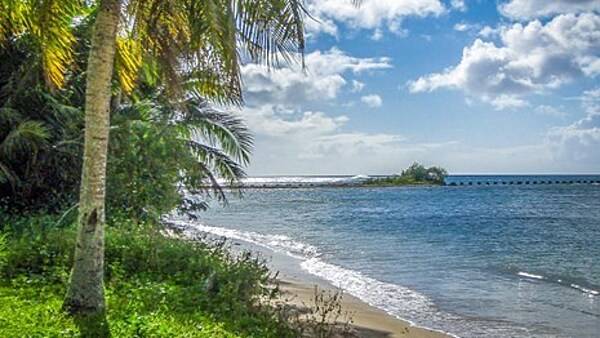 Peaceful beach at the War in the Pacific National Historical Park. Photo courtesy of the US National Park Service.