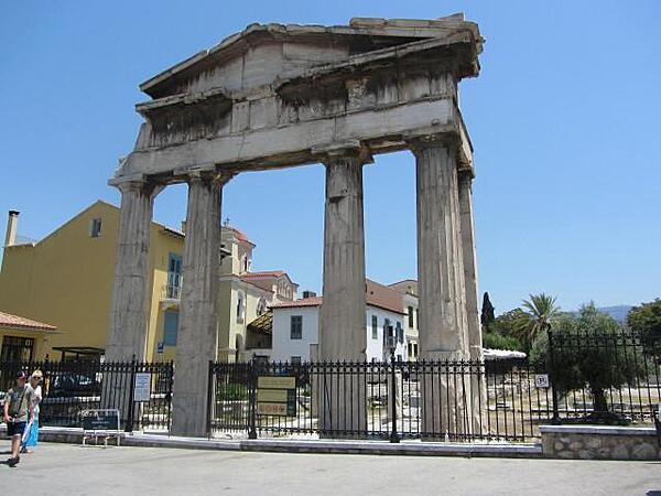 Entrance arch into the Roman Forum and Tower of the Wind in Athens. This area was used as the principal marketplace and agora by the Romans beginning in the 1st century A.D. It was a commercial and administrative center of the city until the 19th century.