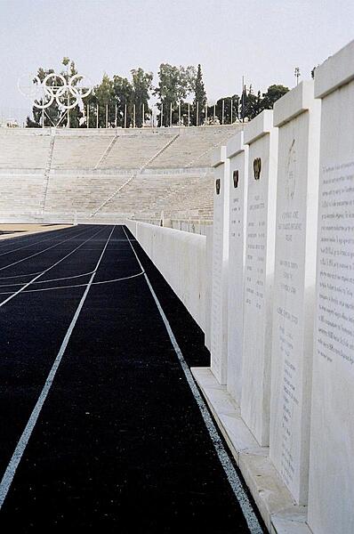Panathinaiko Stadium in Athens was the site of the 1896 Olympic Games. The tablets on the right list the Olympic winners.