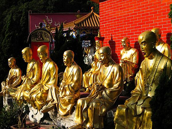 These golden Buddhas are just a few of the many found at the Temple of 10,000 Buddhas in Hong Kong. Life-size statues line the steep flight of over 400 steps leading to the Temple. The actual number of Buddhas is more than 13,000.