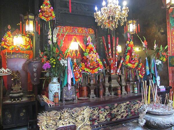 The Man Mo Temple in Tai Po, Hong Kong. Dedicated to Man (literature) and Mo (military), the incense-filled temple was built in 1893 in the style of a central walled compound to emphasize seclusion.