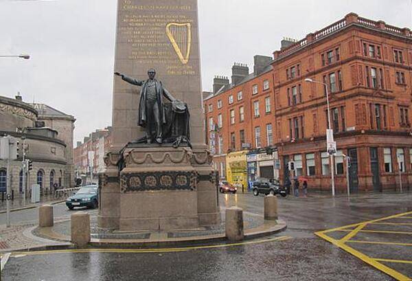 A statue of Charles Stewart Parnell in upper O'Connell Street near Parnell Square. Parnell was a 19th-century member of Parliament and a champion of home rule for Ireland (he is often referred to as "the uncrowned King of Ireland").