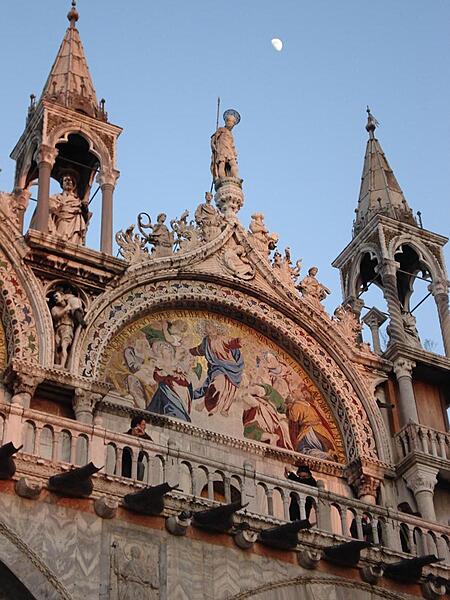 One of the four gilded lunettes on the facade of St. Mark's Cathedral in Venice.